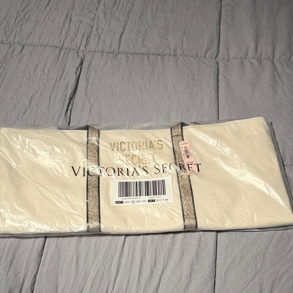 Victoria's Secret Handbags - Victoria's Secret Beige Tote with Gold Accents